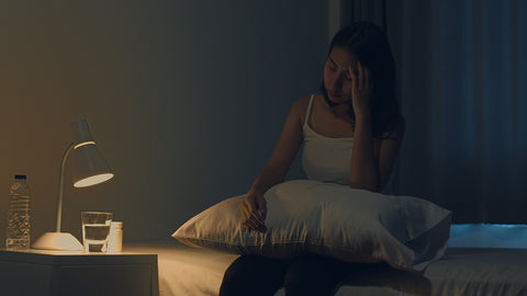 sleepless night with insomnia symptoms. Weighted blankets can reduce stress and anxiety